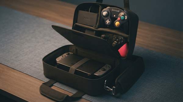 Editorial illustration for Five Switch 2 Travel Accessories, Matched to the Way You Actually Travel